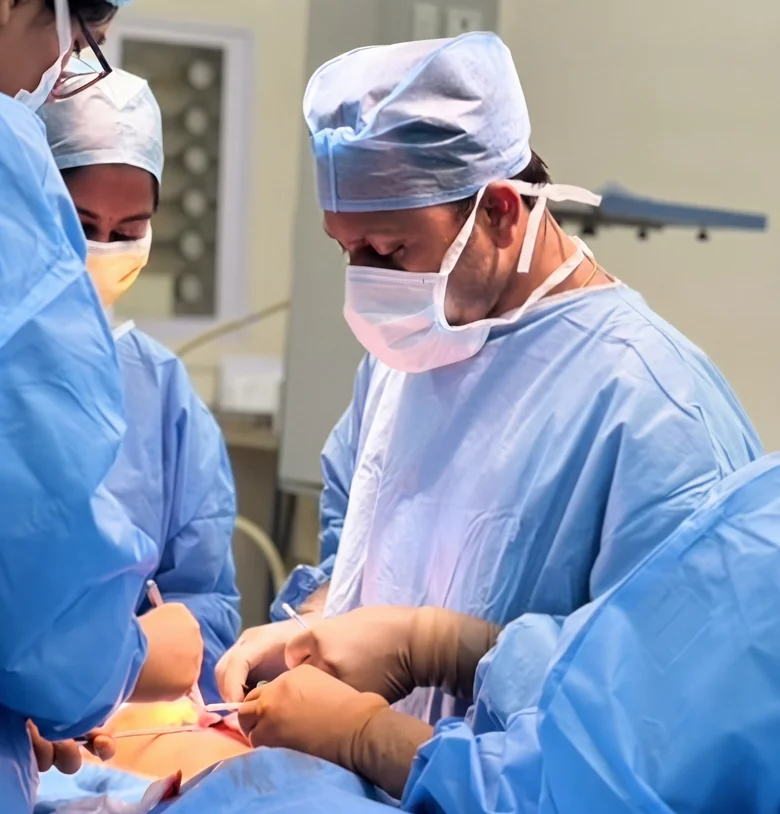 Dr. Raghul M Operating in the Operating Theater